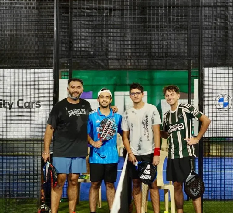 Team Expressing Joy Moment at the Amateur Padel Tournament - BMW Infinity Cars